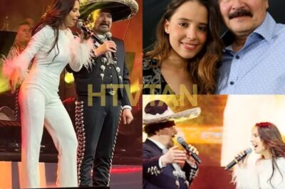 IMPRESIONANTE! MAJO AGUILAR CANTA JUNTO A SU PADRE ANTONIO AGUILAR JR. Y DEJA AL PÚBLICO EN SHOCK EN EL TEATRO METROPOLITÁN En una noche llena de emoción y sorpresas, Majo Aguilar celebró su cumpleaños de una manera inolvidable al cantar junto a su padre, Antonio Aguilar Jr., en el Teatro Metropólitan. La interpretación de los temas de Antonio Aguilar dejó al público eufórico. ¿Cómo se vivió este emocionante momento en el escenario? #MajoAguilar #AntonioAguilar #ConciertoInolvidable 👇👇  Majo Aguilar celebró su 31 cumpleaños en un escenario repleto de emociones, pero el verdadero momento que robó el show fue cuando su padre, Antonio Aguilar Jr., se unió a ella para interpretar dos emblemáticos temas de Antonio Aguilar. Entre lágrimas, Majo le dedicó un mensaje de amor y respeto a su padre, resaltando la importancia de la familia y las raíces. El público, conmovido, vivió uno de los momentos más emotivos de la noche. ¿Qué tan significativa fue esta conexión entre padre e hija para la familia Aguilar?